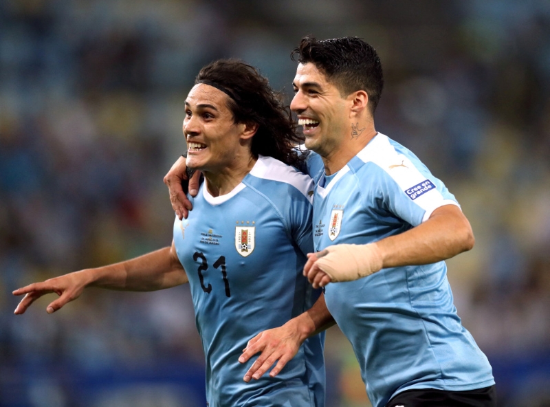 卡雲尼(左)和蘇亞雷斯已經是最後一屆出戰世盃。Reuters