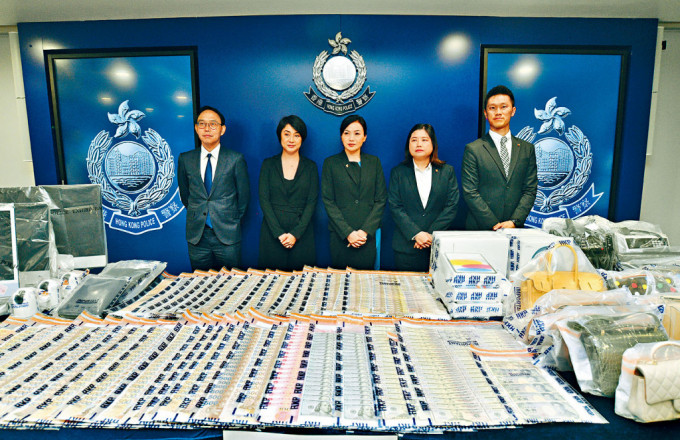 警方举行记者会展示行动中检获的大批证物,并考虑充公6700万元犯罪得益。 警方举行记者会展示行动中检获的大批证物,并考虑充公6700万元犯罪得益。