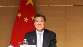 何立峰会见加拿大财政部部长商鹏飞