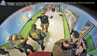 最新片段曝光，显示警员在课室外迟迟未攻入枪手所在的课室，在走廊等候了长达77分钟。
