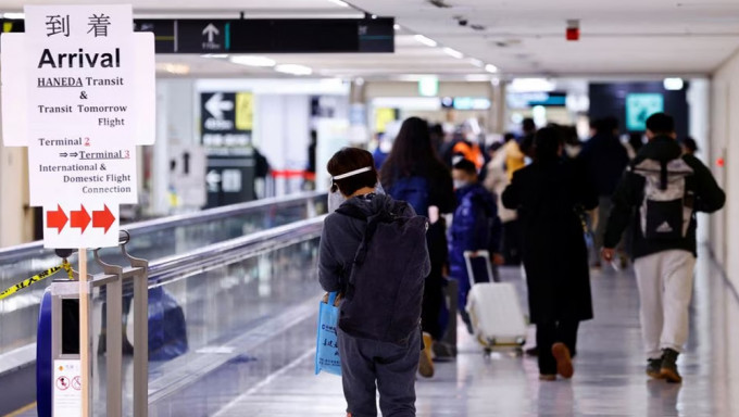 日本擬最快2月放寬針對中國旅客的防疫措施。路透