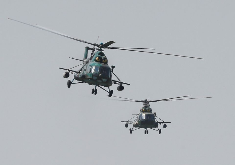軍用直升機大型軍事演習中飛行。路透資料圖