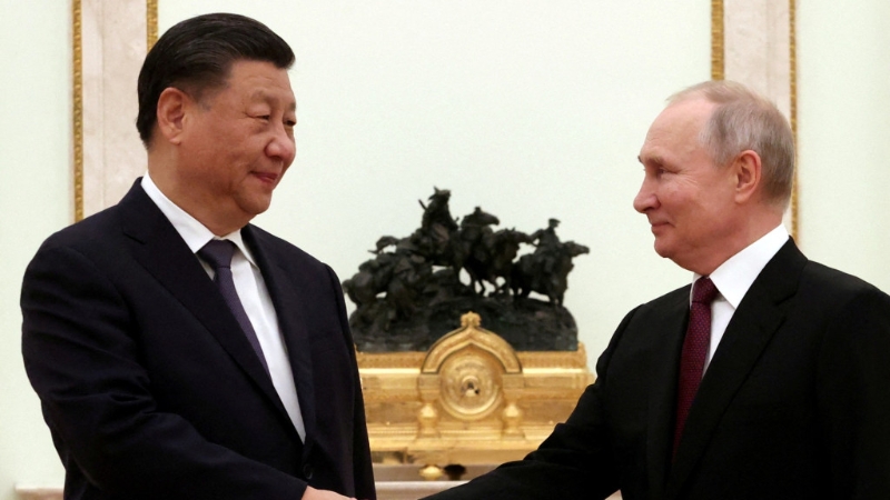 习近平在克里姆林宫与总统普京进行一对一非正式会谈。 美联社