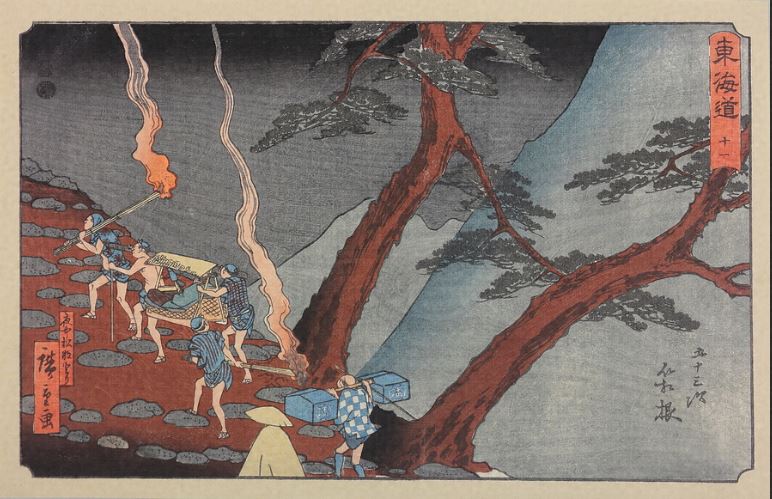 日本浮世繪｜歌川廣重大叔圖譜：《東海道十一 五十三次 箱根 夜中松明とり》，一行人藉著火把的光芒爬上了石板路，但日落之後就無法通過箱根關卡了。