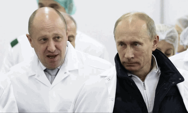 卢卡申科说，普京（右）亲口告知普里戈任（左），提醒他有人要杀他。