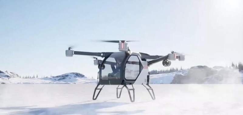 可乘载2人的独立飞行器由纯电驱动，并可从运载的增程混能车补充电力。