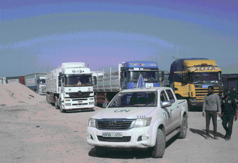 联合国救援物资车队进入加沙卸载。 路透社