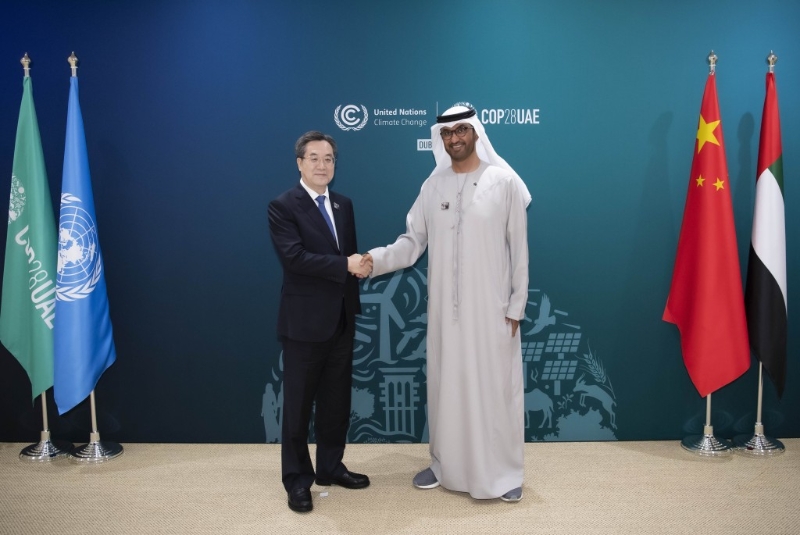 丁薛祥会见联合国气候变化迪拜大会主席苏尔坦。