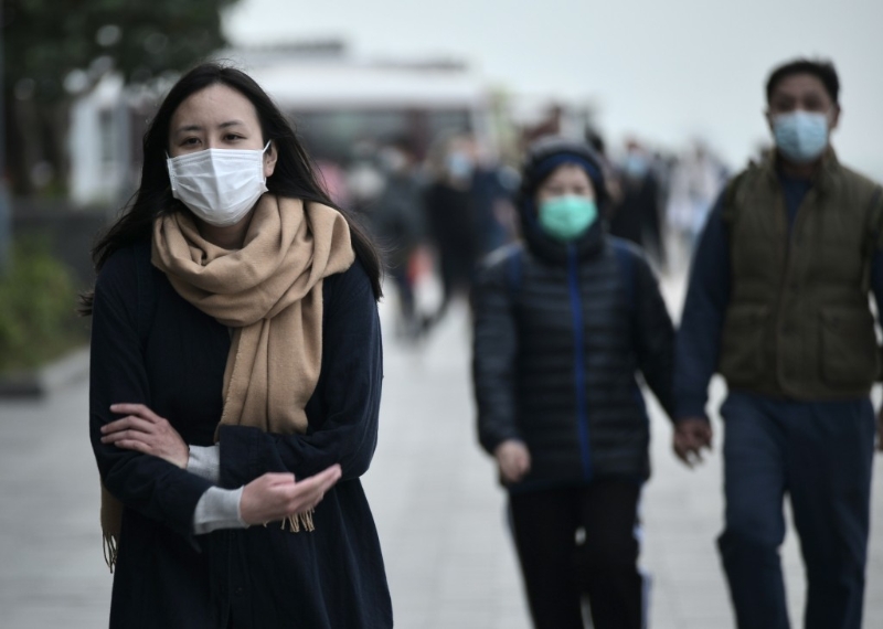 年近岁晚,天气又再转凉,市民记紧添衣。 资料图片 年近岁晚,天气又再转凉,市民记紧添衣。 资料图片