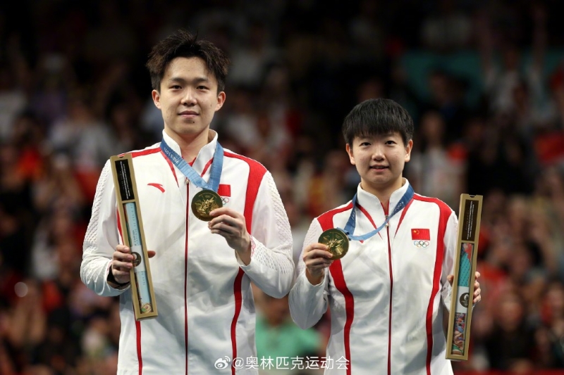 孙颖莎与拍档王楚钦在乒乓混双夺金。 孙颖莎与拍档王楚钦在乒乓混双夺金。