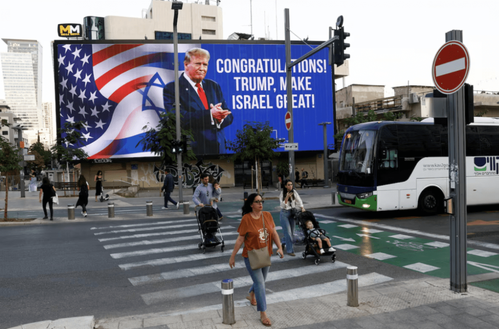 特朗普胜出美国总统选举后,以色列首都耶路撒冷和第二大城特拉维夫等的市面上出现多张祝贺特朗普当选的宣传牌。 路透社.png 特朗普胜出美国总统选举后,以色列首都耶路撒冷和第二大城特拉维夫等的市面上出现多张祝贺特朗普当选的宣传牌。 路透社.png