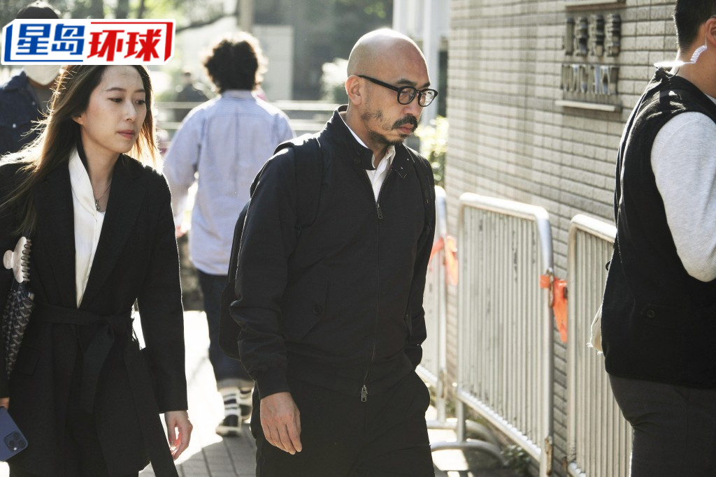 黎智英代表大律师关文渭。 黎智英代表大律师关文渭。