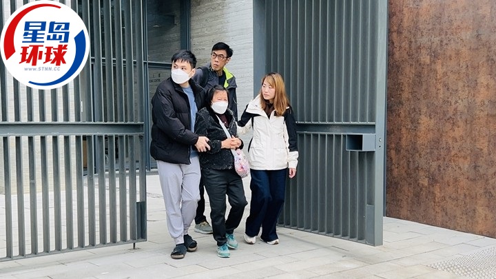 死者太太(中)伤心认尸。 蔡楚辉摄 死者太太(中)伤心认尸。 蔡楚辉摄