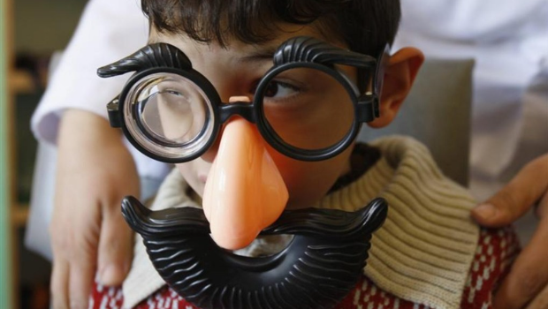 约旦一所自闭症咨询中心内一名患病儿童。路透社 约旦一所自闭症咨询中心内一名患病儿童。路透社