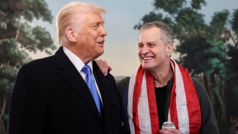 特朗普在白宫办活动，欢迎福格尔（Marc Fogel）回国。 路透社