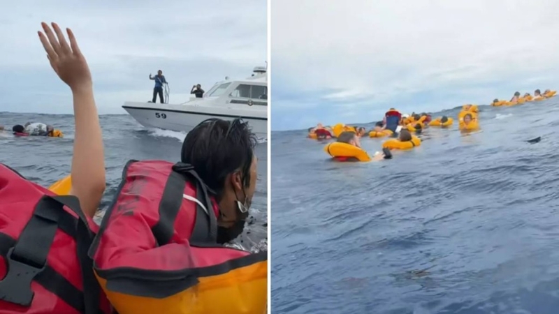 快艇沉船在海上待救。 快艇沉船在海上待救。