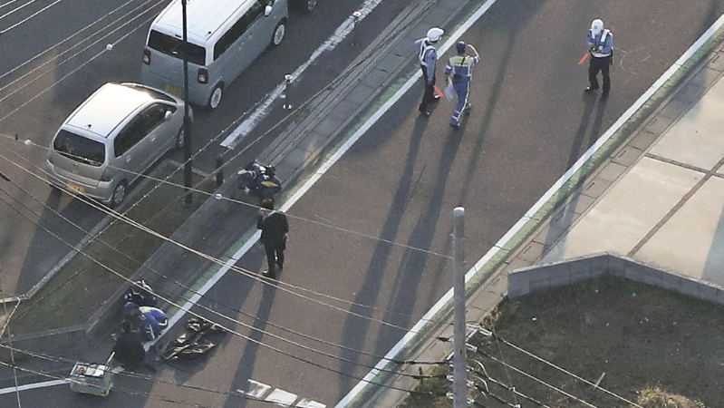 邓洪鹏驾车撞伤小学生意外现场。 法新社 邓洪鹏驾车撞伤小学生意外现场。 法新社
