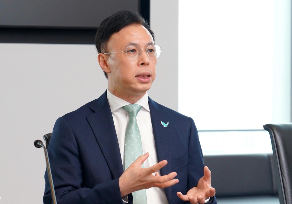 证监会市场监察部执行董事梁仲贤。