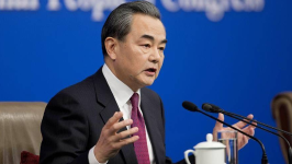 蒙古国总理乌其尔勒会见王毅